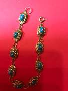 Ladies 18k yellow gold and enamel Egyptian scarab bracelet
