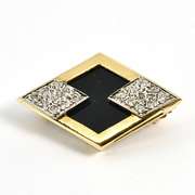 Modern Onyx and Diamond Brooch