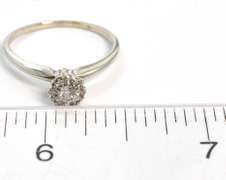 Shimmering 0.19CTW Diamond Ring in 14KT White Gold