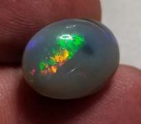 Rare bi-color untreated 6.59ct Welo Black Opal