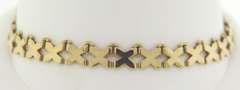 Pretty Yellow Gold X Link Line Bracelet