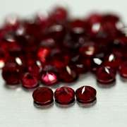 Premium diamond cut 5.19ct Rhodolite Garnet set