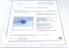 Platinum Tanzanite & Diamond Ring