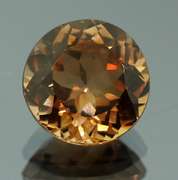 Rich red amber 7.67ct Imperial Topaz solitaire