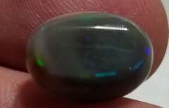 Rare bi-color untreated 6.59ct Welo Black Opal
