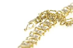 10K Yellow Gold 0.99 Ctw Diamond Cluster Wavy Link Tennis Bracelet