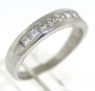 Charming Princess Cut Channel Set Diamond Band