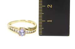 10K Yellow Gold Oval Tanzanite Diamond Accent Wavy Ring