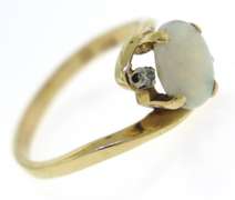 Beautiful Opal and Diamond Yellow Gold Ring