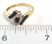 Eye-Catching Sapphire & Diamond Accent Ring in Yellow Gold