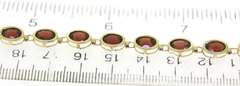 Pretty Yellow Gold Garnet Bezel Set Bracelet