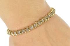 10K Yellow Gold 0.99 Ctw Diamond Cluster Wavy Link Tennis Bracelet