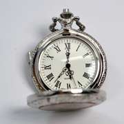 Ornate Men's Pocket Watch with Half Dollar .