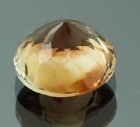 Rich red amber 4.76ct Imperial Topaz solitaire