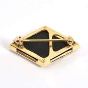 Modern Onyx and Diamond Brooch