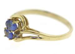 Stunning Tanzanite and Diamond Yellow Gold Ring