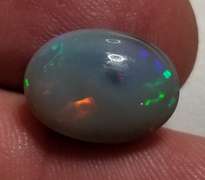 Rare bi-color untreated 6.59ct Welo Black Opal