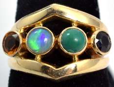 Interesting Multi-Stone Ring in 14KT Yellow Gold