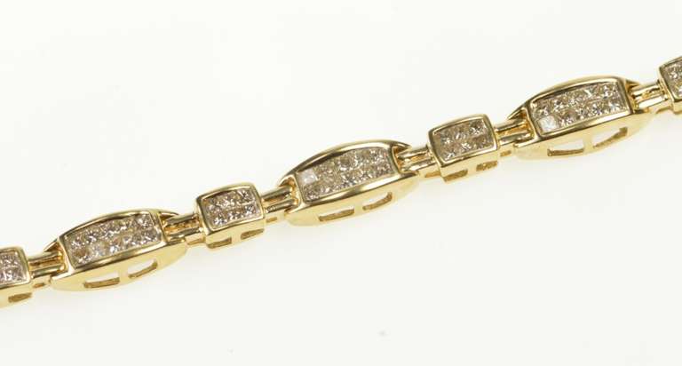 14K Yellow Gold Curved Invisible Diamond Encrusted Tennis Bracelet