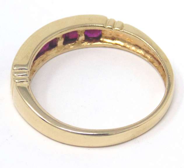 Elegant Yellow Gold Ruby Channel Set Ring
