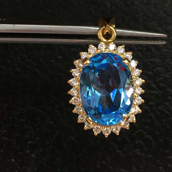 Amazing 24.00 Carat Blue Topaz Pendant, 14kt Gold