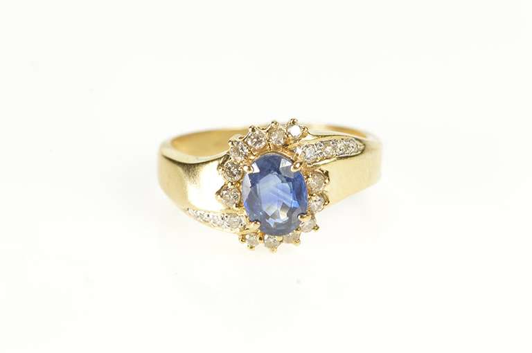 14K Yellow Gold 1.30 Ctw Oval Sapphire Diamond Halo Bypass Ring