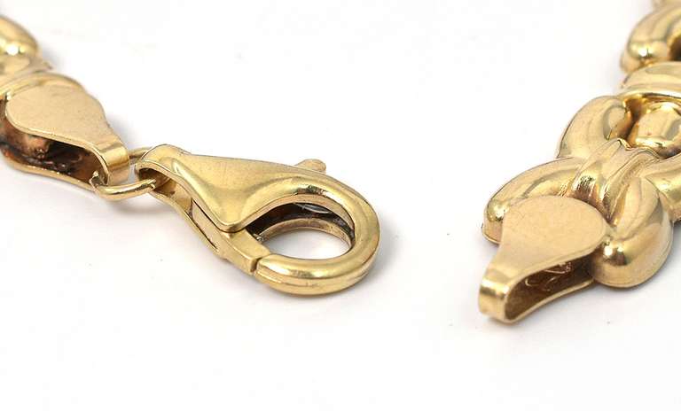 Interesting "X" Bracelet in Yellow Gold