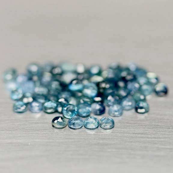 Multi-hue 6.81ct natural blue Sapphire set