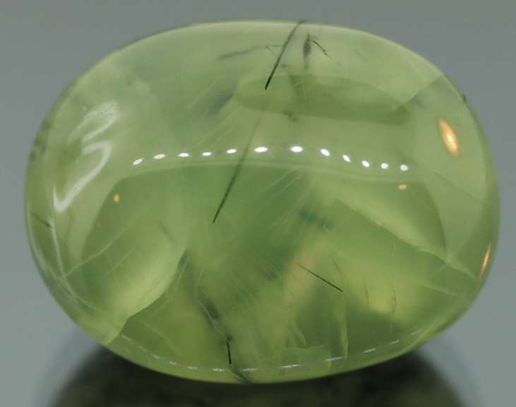 Collectors 51.38ct heavily rutilated Prehnite