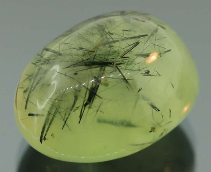 Collectors 51.38ct heavily rutilated Prehnite
