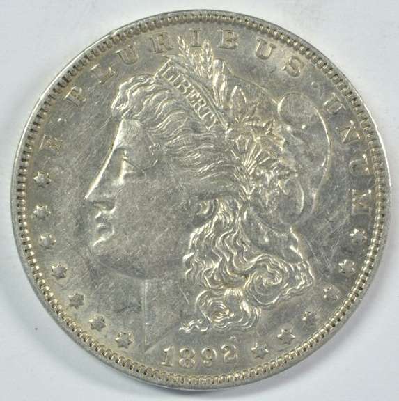 Near Mint 1892-O Morgan Silver Dollar. Tougher date