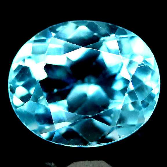 Brilliant 5.87ct oval cut Topaz center stone