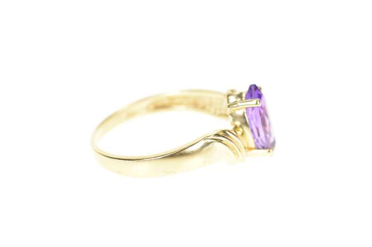 10K Yellow Gold Marquise Amethyst Solitaire Wavy Bypass Ring