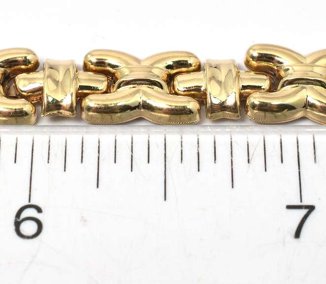 Interesting "X" Bracelet in Yellow Gold