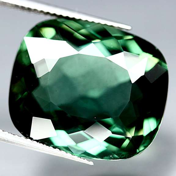 Stunning 24.26ct top green created Amethyst