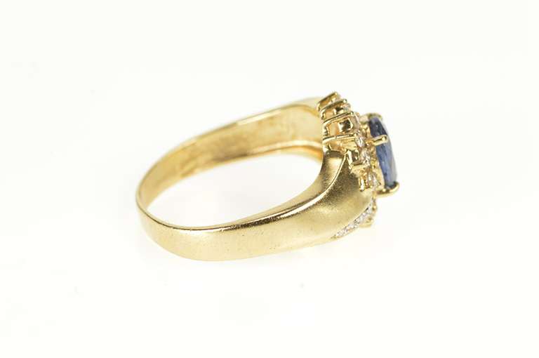 14K Yellow Gold 1.30 Ctw Oval Sapphire Diamond Halo Bypass Ring