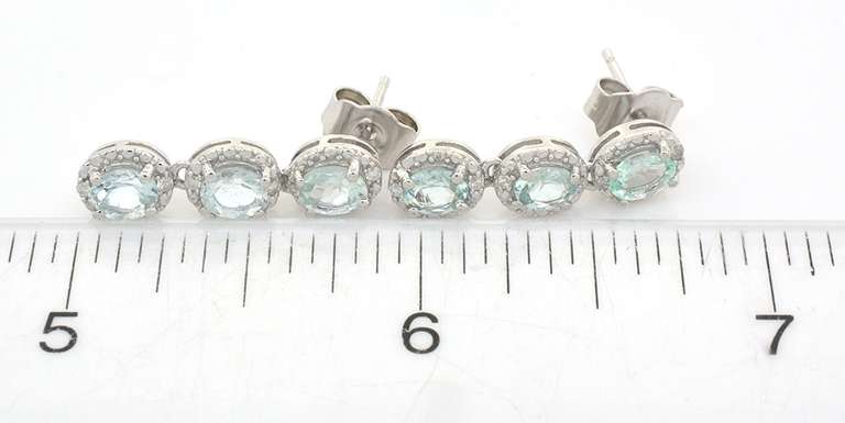 Fashionable Aquamarine & Diamond Dangle Earrings in Sterling Silver