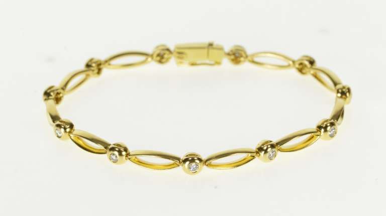 18K Yellow Gold Oval Link Round Diamond Inset Tennis Bracelet
