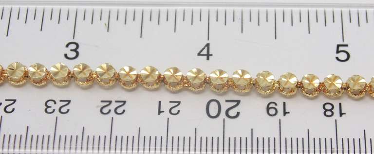 Pretty 14kt YG Diamond Cut Circle Link Bracelet