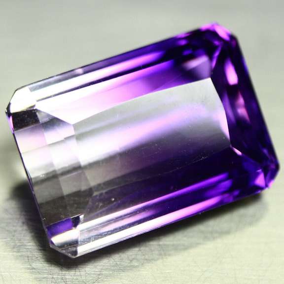 Beautiful 27.22ct top color created Ametrine