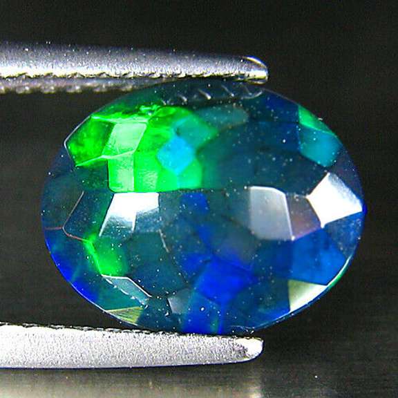 Fully faceted 1.46ct oval cut Black Opal