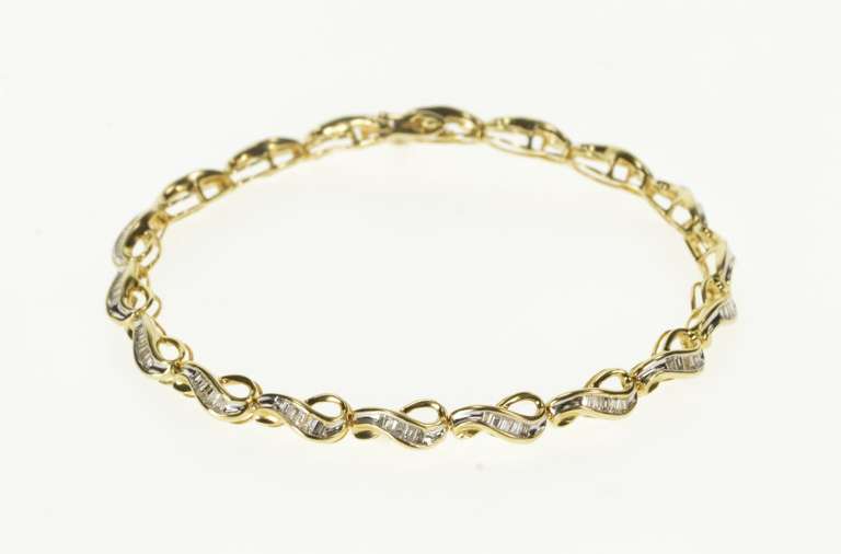 10K Yellow Gold Baguette Diamond Wavy Loop Link Tennis Bracelet