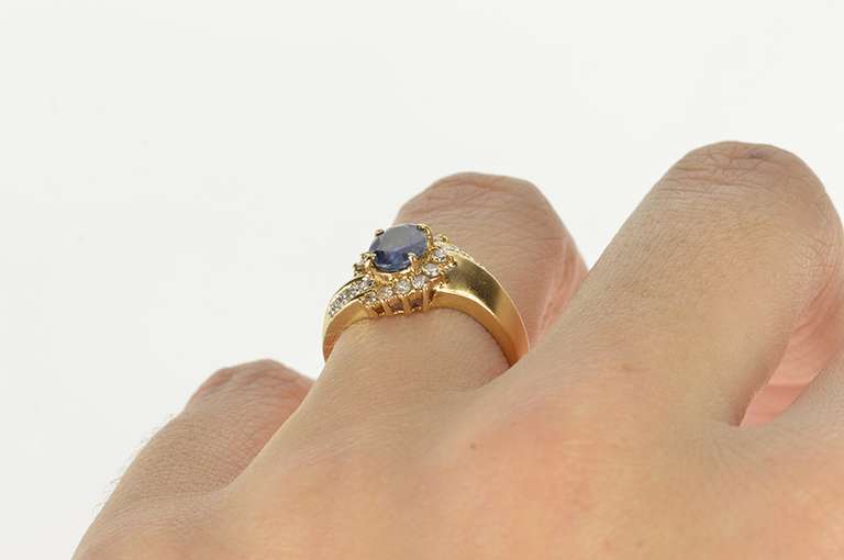 14K Yellow Gold 1.30 Ctw Oval Sapphire Diamond Halo Bypass Ring