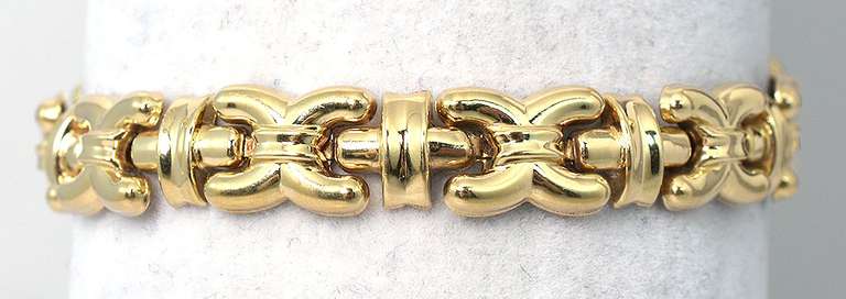 Interesting "X" Bracelet in Yellow Gold