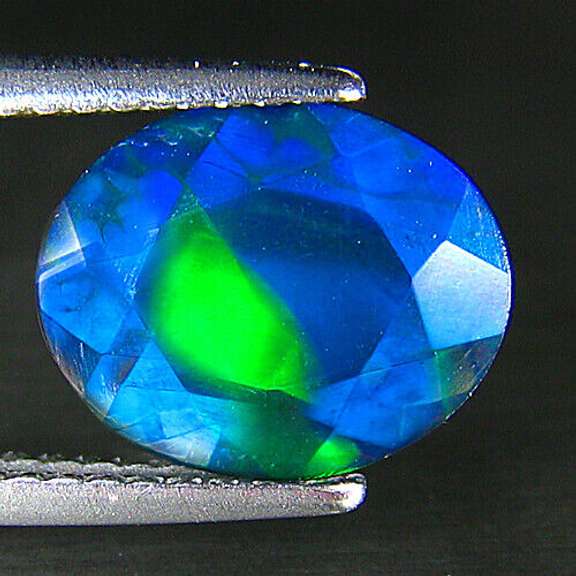 Fully faceted 1.46ct oval cut Black Opal
