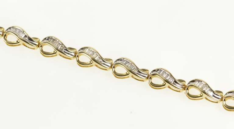 10K Yellow Gold Baguette Diamond Wavy Loop Link Tennis Bracelet