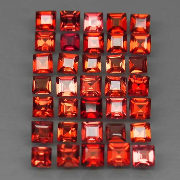 Pristine 6.52ct open color VS Garnet set