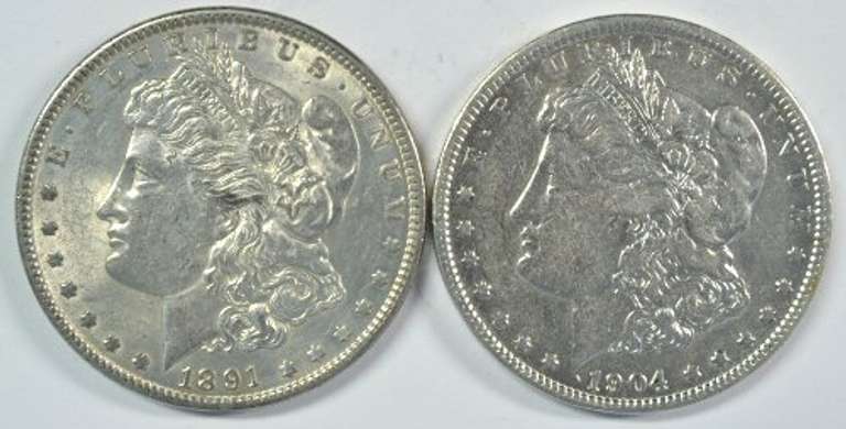 Upper end 1891 & 1904 Morgan Silver Dollars