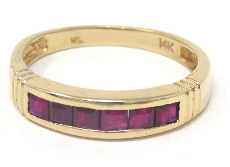 Elegant Yellow Gold Ruby Channel Set Ring