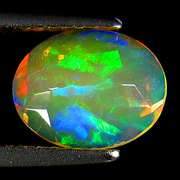Fully faceted 1.13ct high fire floral block pattern Opal